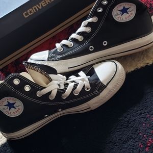 Black and white high top Chuck Taylor's